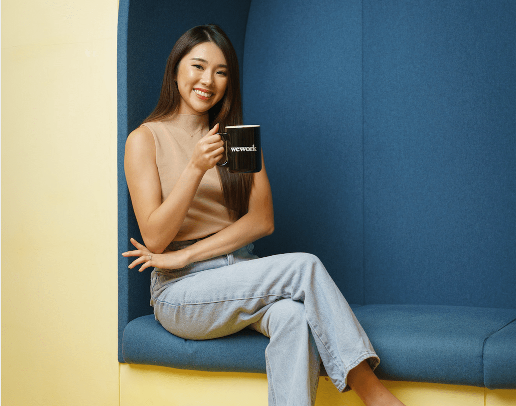 Mongabong lifestyle content creator with her coffee at WeWork Office