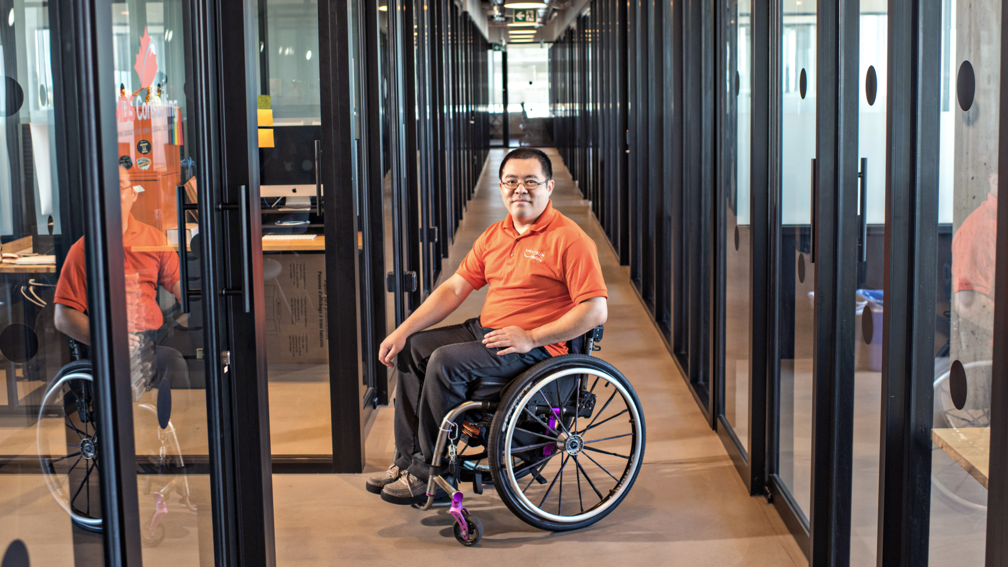 Workplace accessibility expert with his private office.