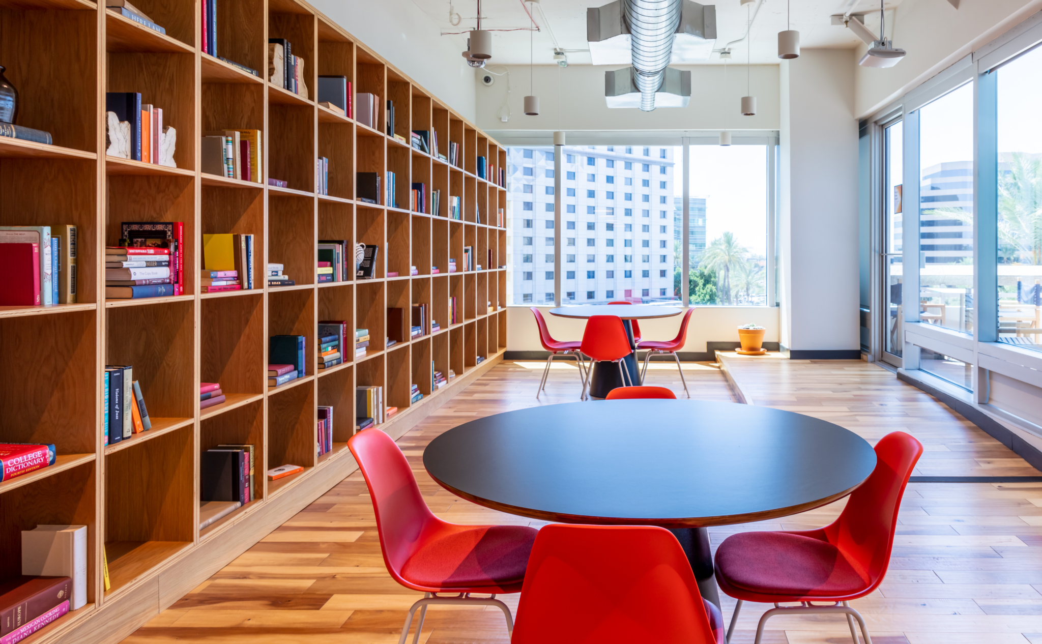 library with tables to read your books