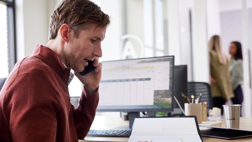 Man on phone in an office