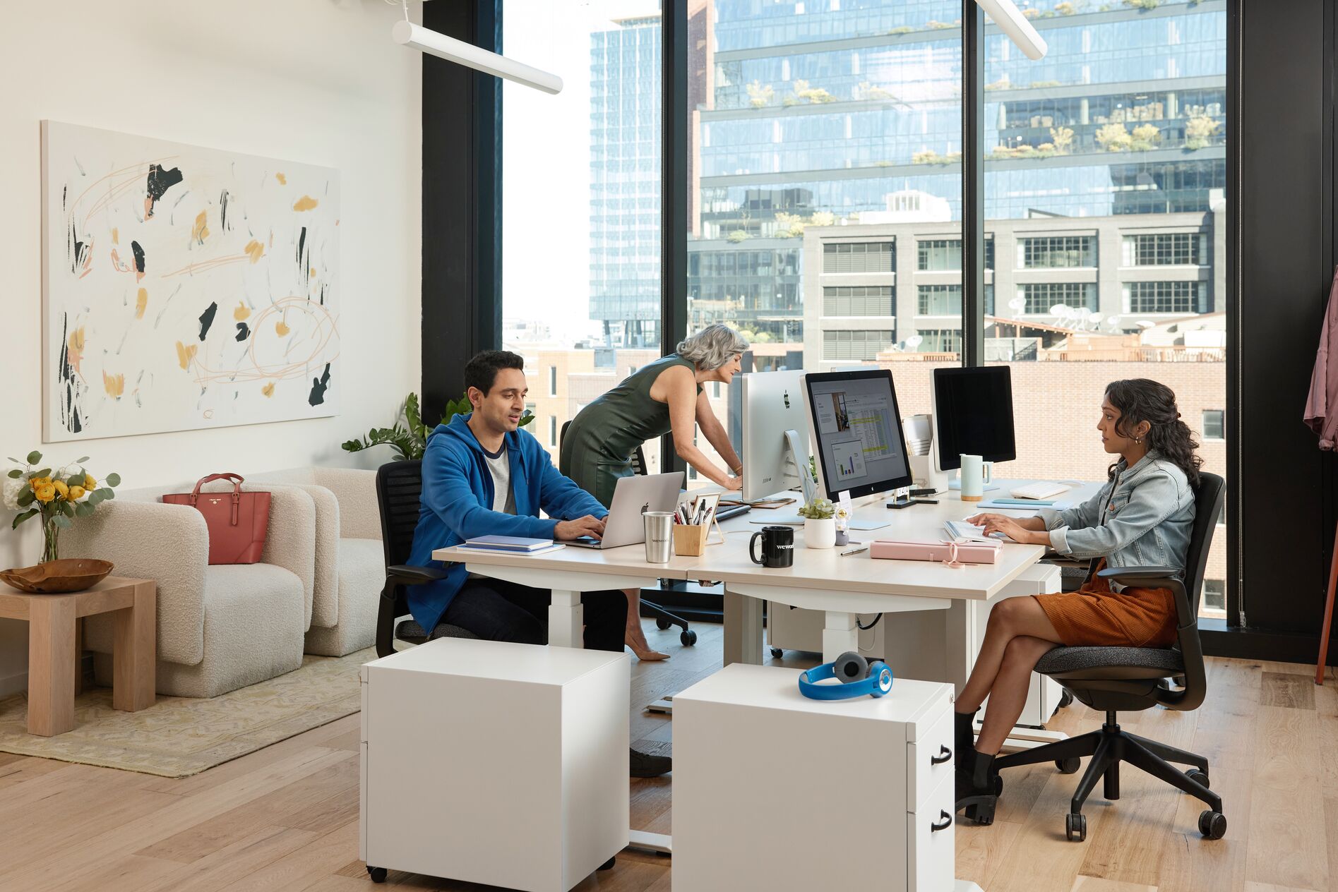 team in meeting room at WeWork