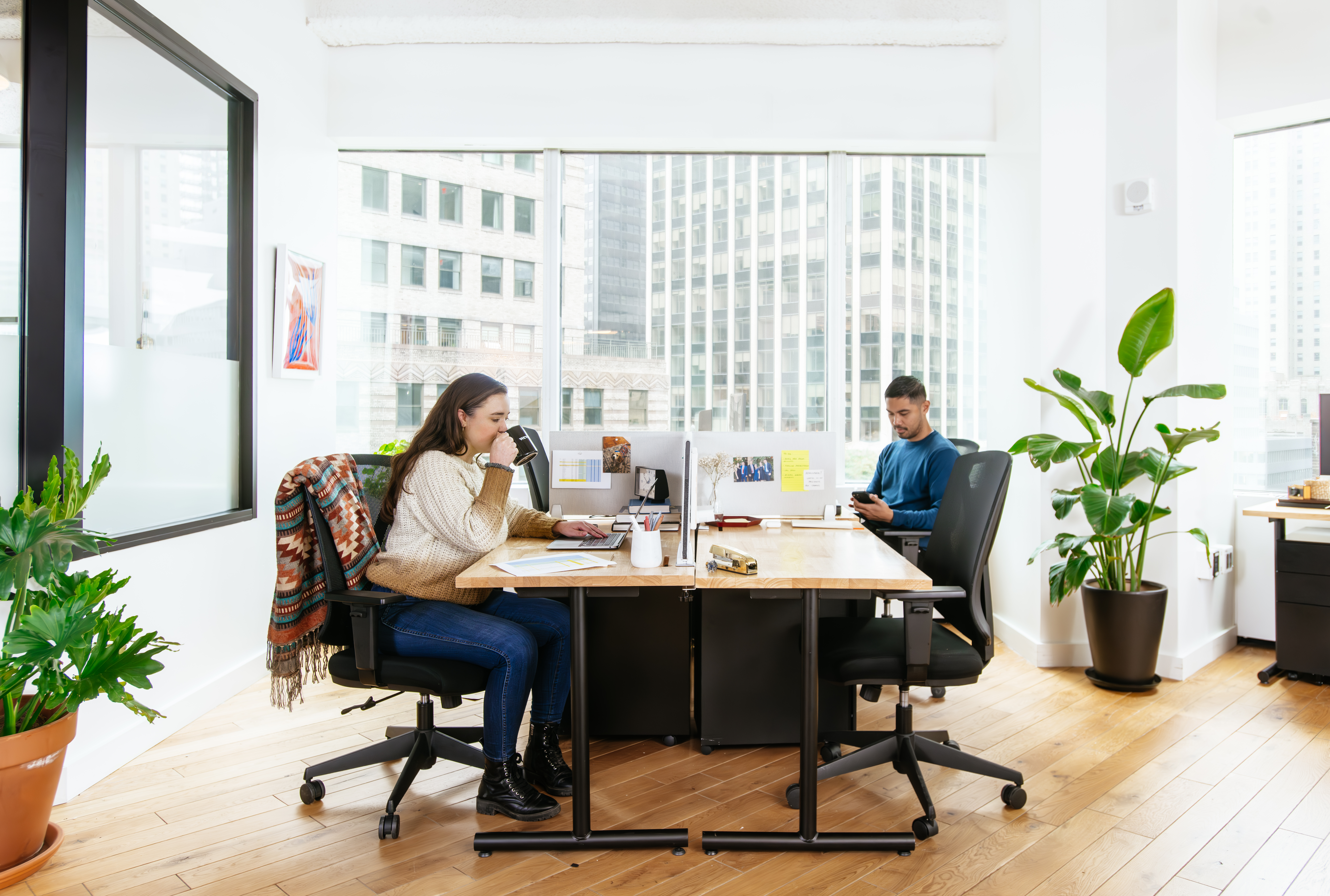 members working at a dedicated desk