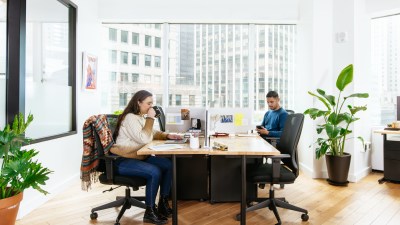 members working at a dedicated desk