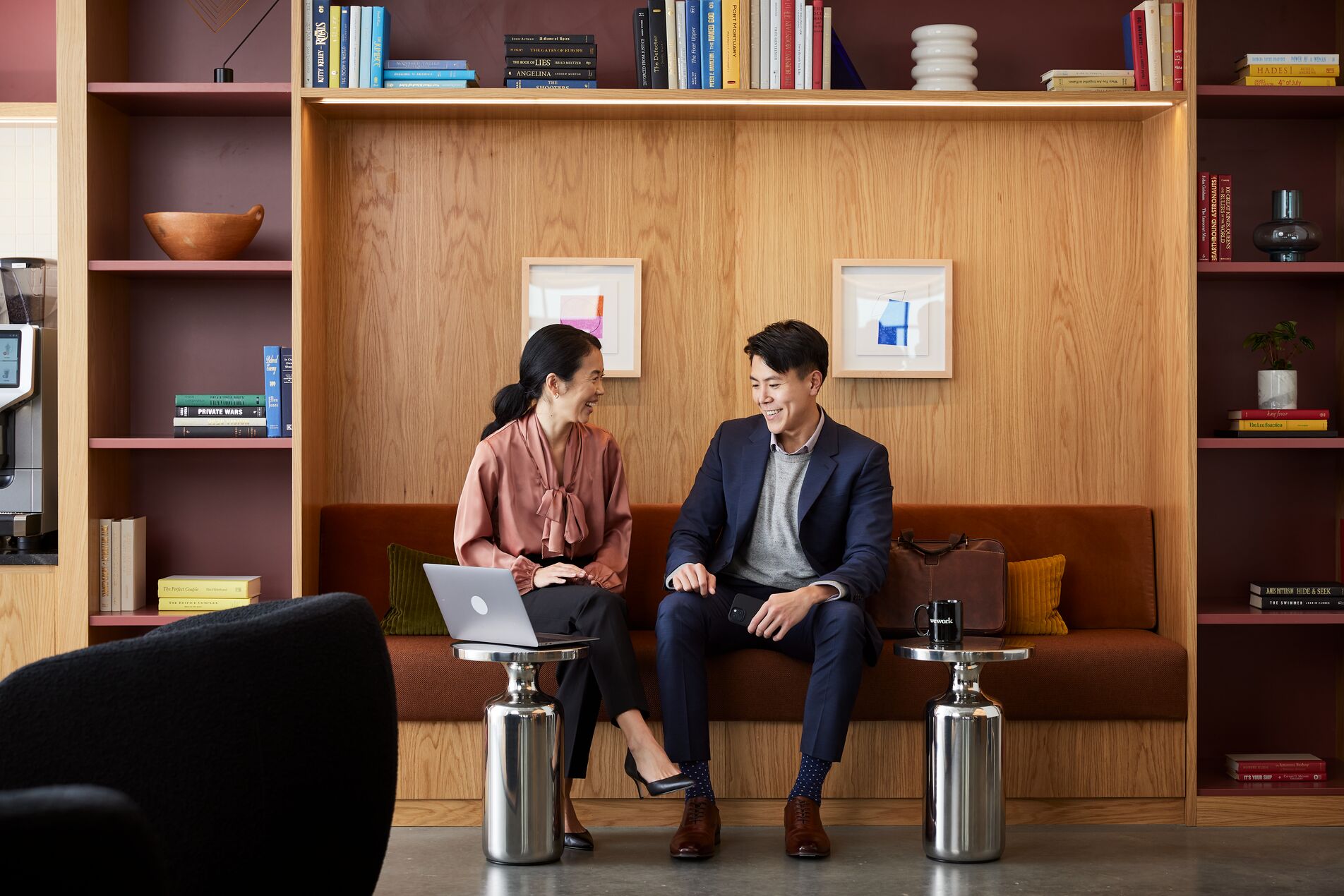 People chatting in a coworking space.