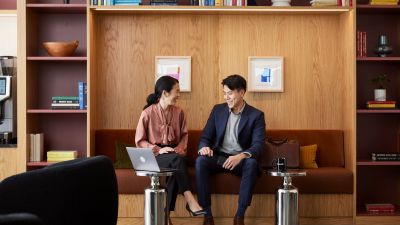 People chatting in a coworking space.
