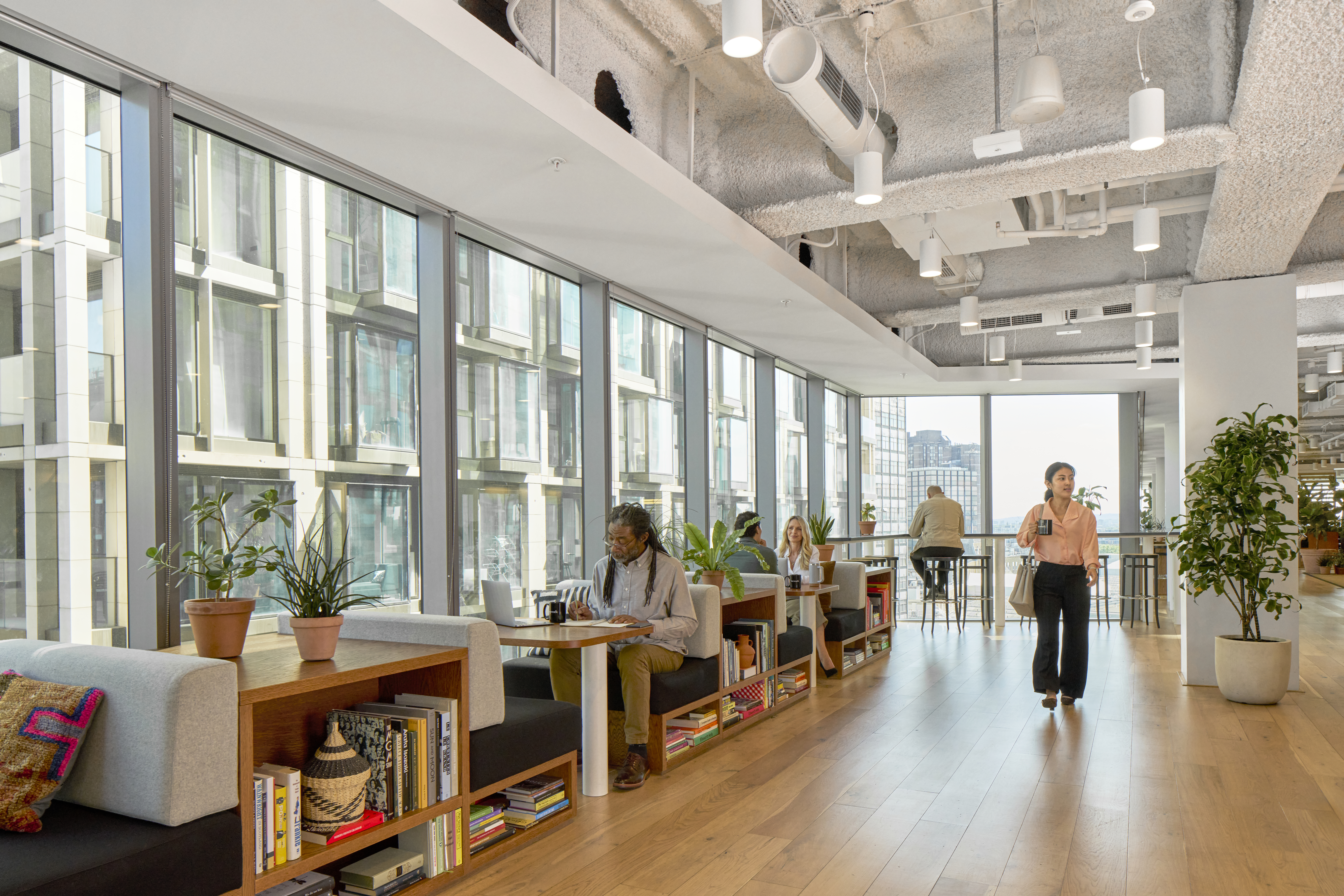 people working in a shared workspace at WeWork