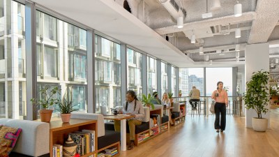 people working in a shared workspace at WeWork
