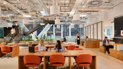 people collaborating in an open shared workspace at WeWork