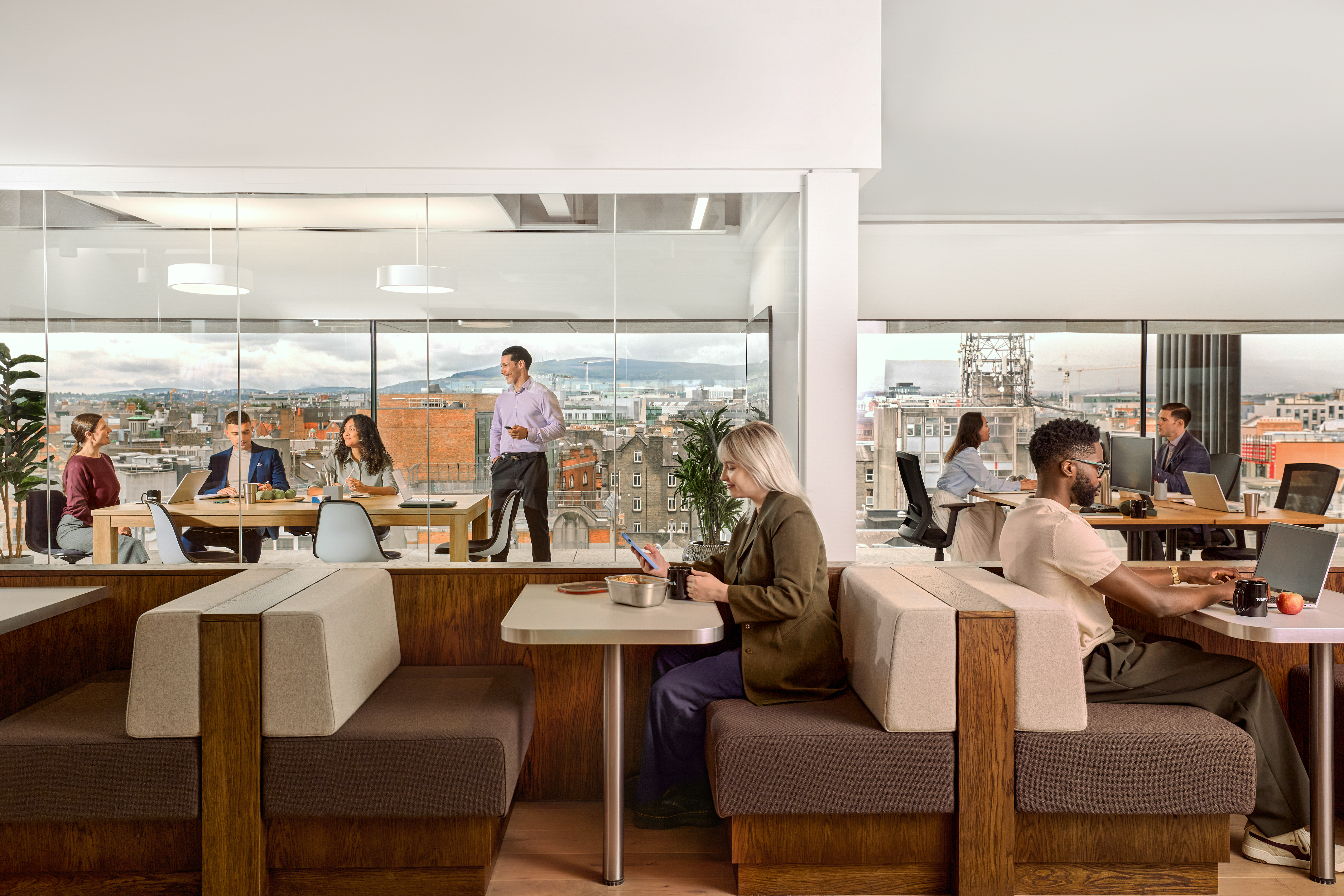 image of WeWork members collaborating at One Central Plaza
