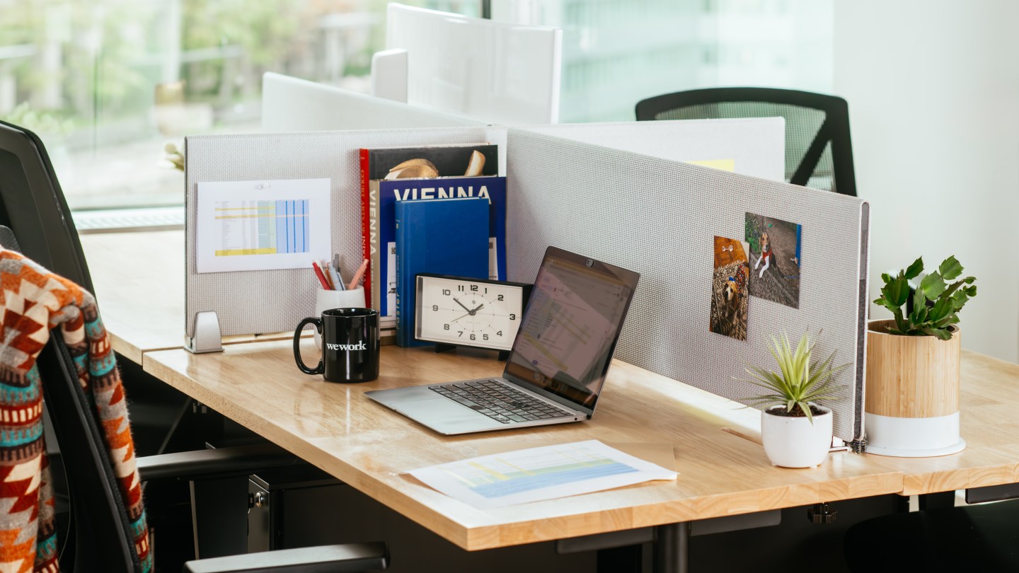 dedicated desk at WeWork for a creative member to focus