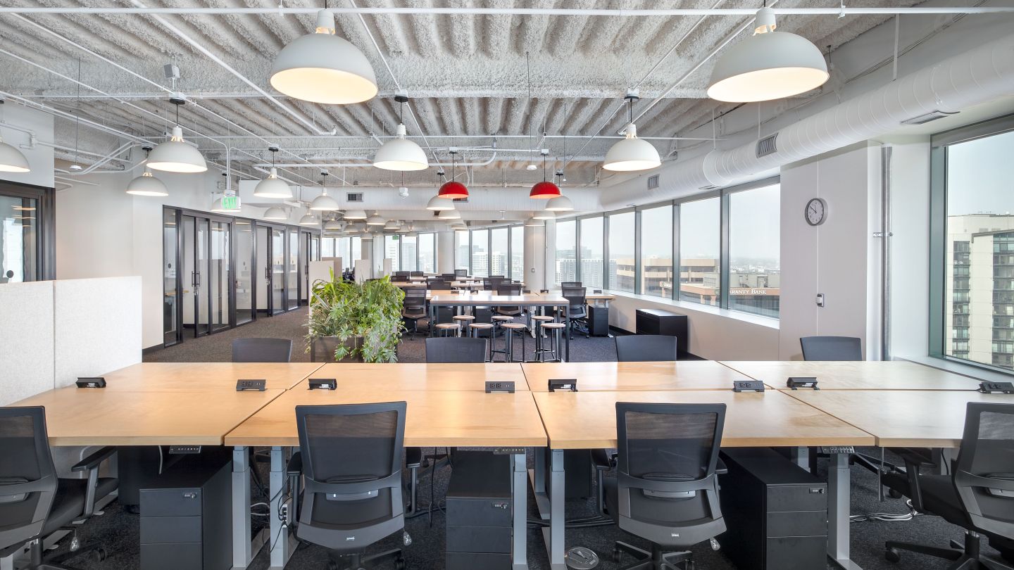 desks at WeWork Tabor Center in Downtown Denver