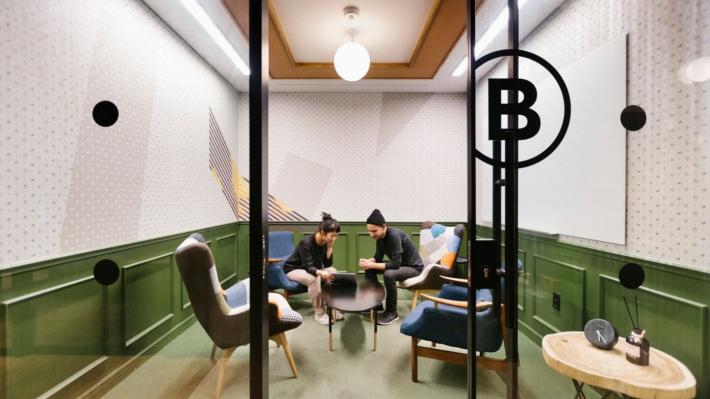 two people focusing in a meeting room at WeWork Gangnam Station, Seoul